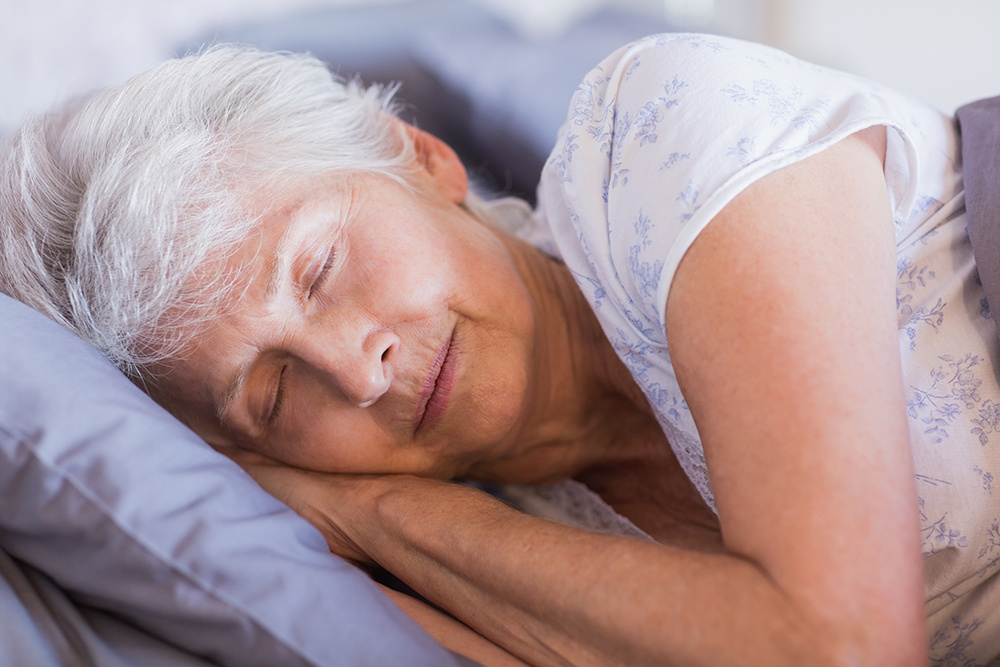 Elderly woman sleeping.